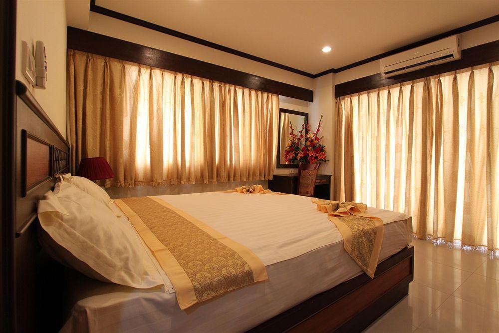 Miloft Sathorn Hotel - Sha Plus Certified Bangkok Esterno foto A bedroom at the hotel